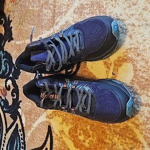 Brand new asics mid top shoes